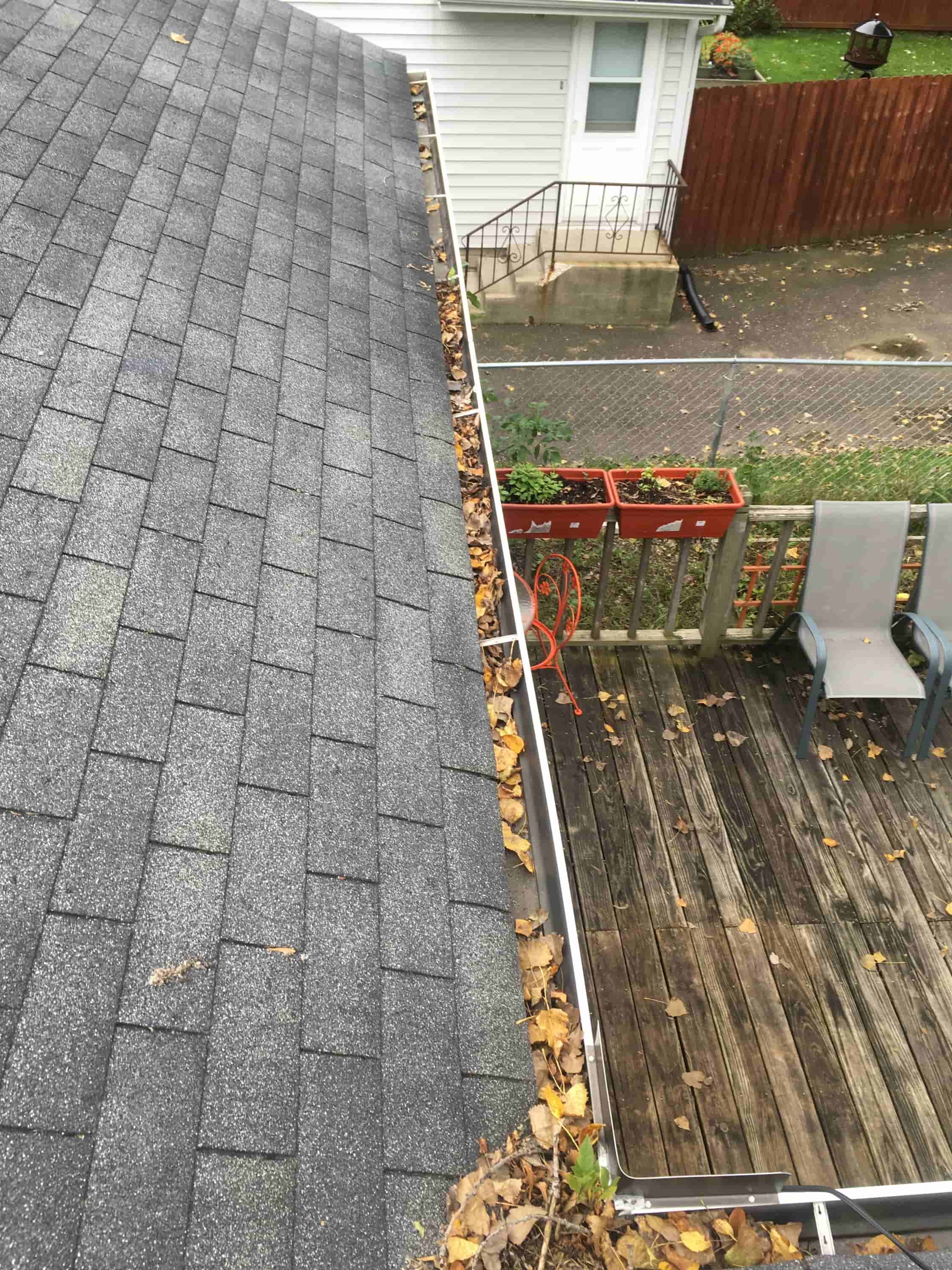 clean gutters with gutter guards