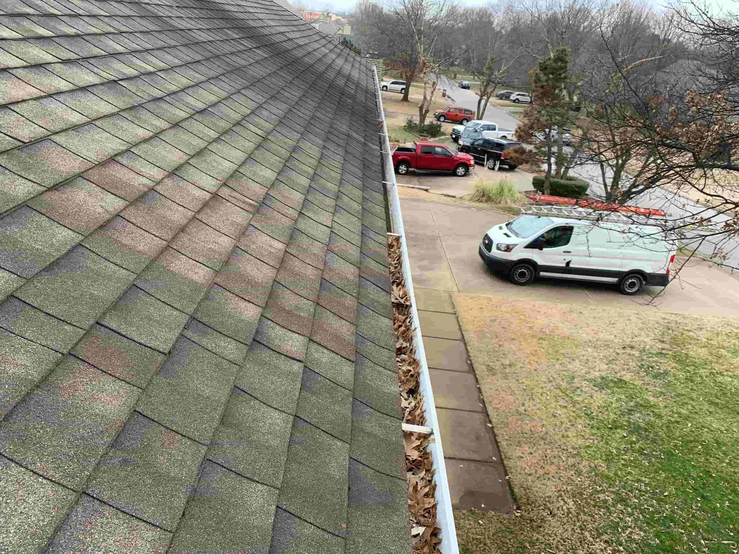 cleaning out rain gutters