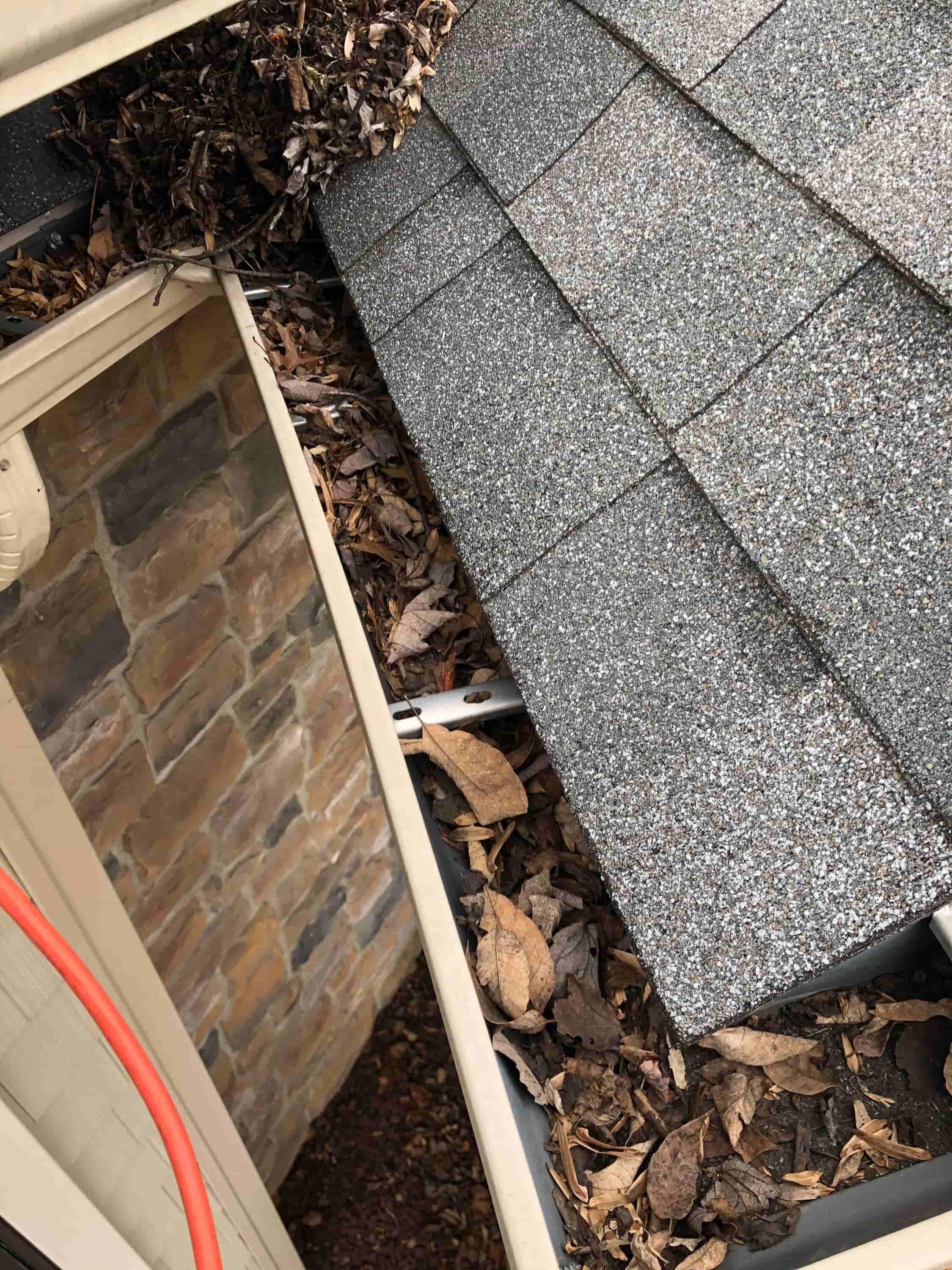 clean your gutters from the ground