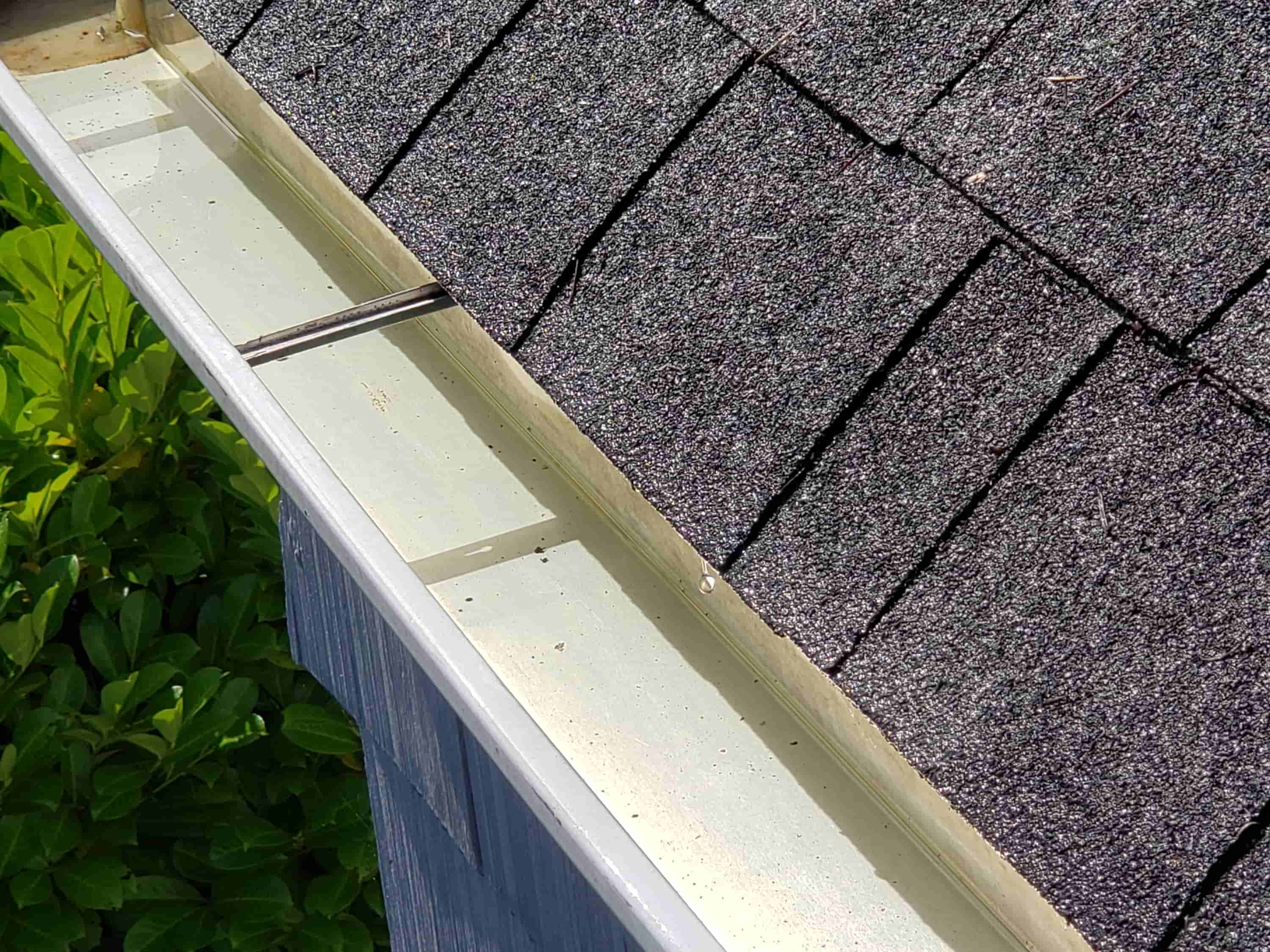 cleaning downspouts