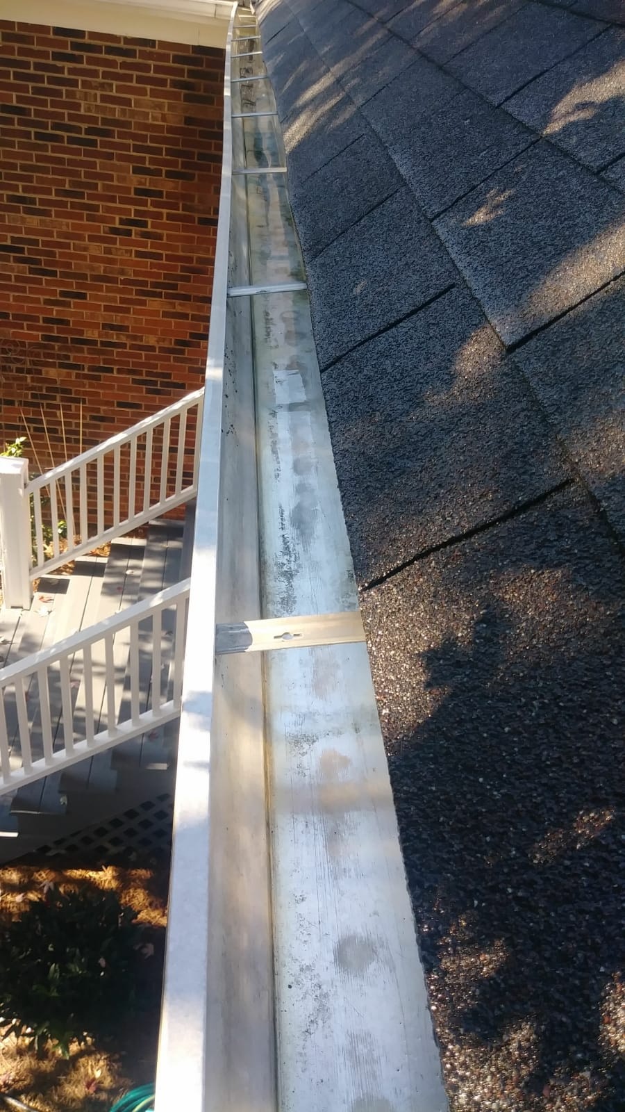 clean clogged gutter downspout