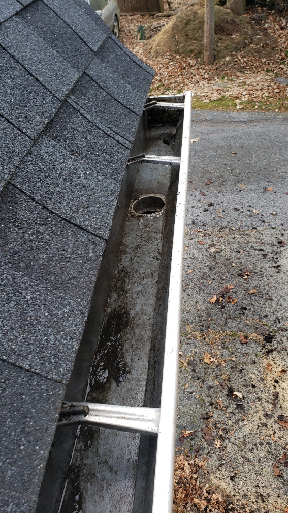 how to unclog gutter downspout