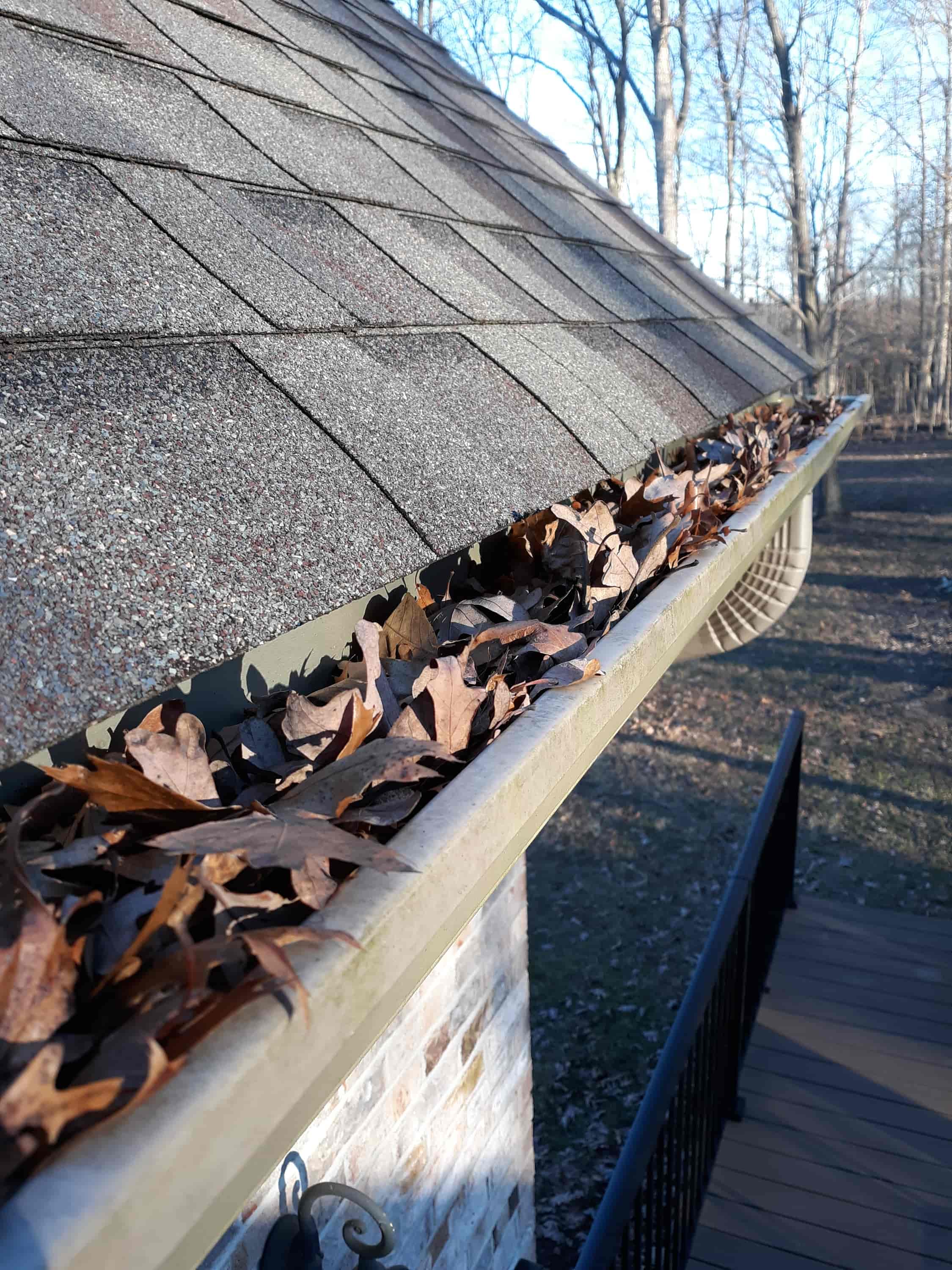 how to unclog gutter downspout