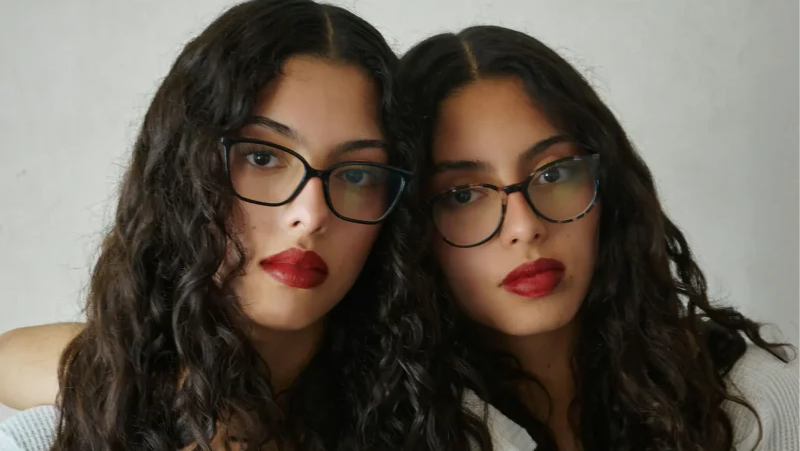 Twins women with glasses