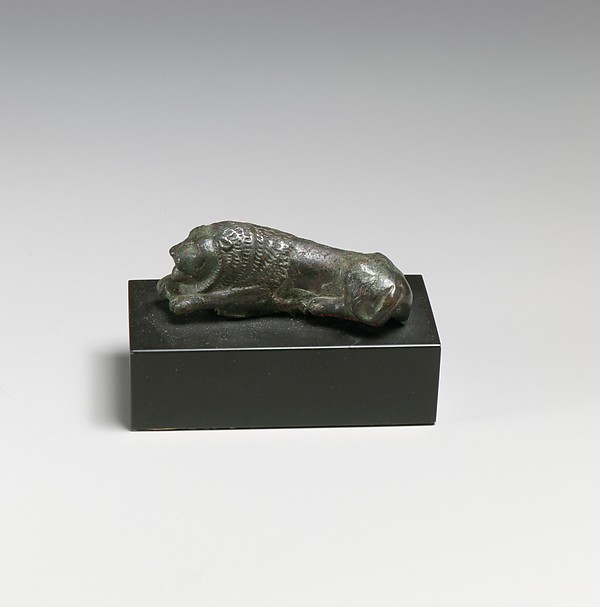 Bronze statuette of a recumbent lion