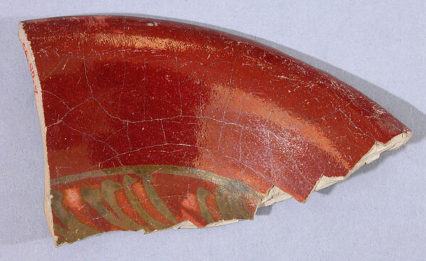 Fragment of a Ruby Luster Bowl Painted in Goldish Luster