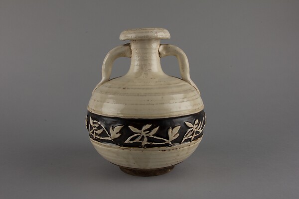 Bottle with floral pattern