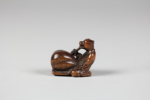 Netsuke: Tanuki no Hara Tsutsumi
