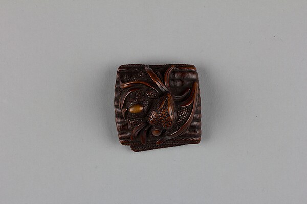 Netsuke of Quail on a Nest of Millet on Matting