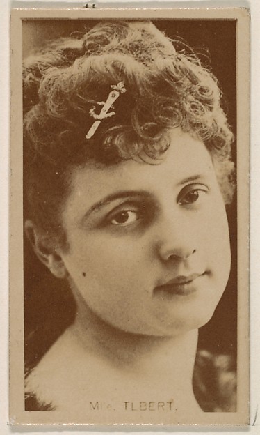 Mlle. Tlbert, from the Actresses series (N245) issued by Kinney Brothers to promote Sweet Caporal Cigarettes