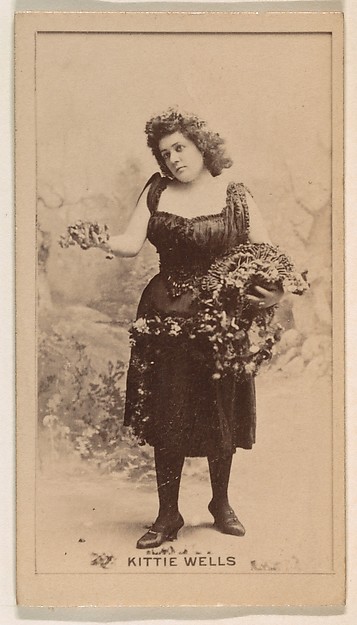 Kittie Wells, from the Actresses series (N245) issued by Kinney Brothers to promote Sweet Caporal Cigarettes