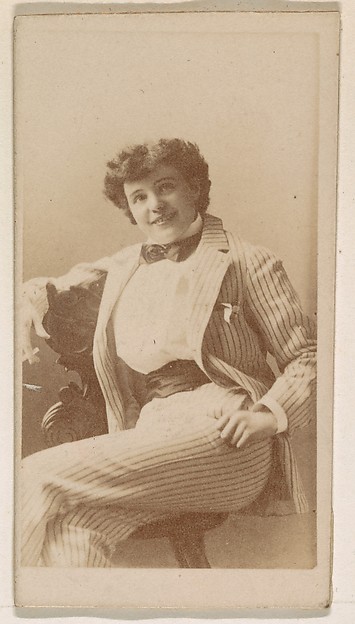 Actress dressed in pinstripe suit, from the Actresses series (N245) issued by Kinney Brothers to promote Sweet Caporal Cigarettes