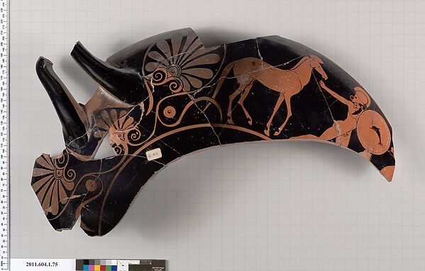 Terracotta fragment of a kylix (drinking cup)