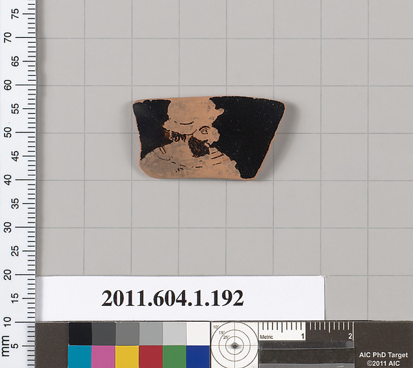 Terracotta fragment of a kylix (drinking cup)