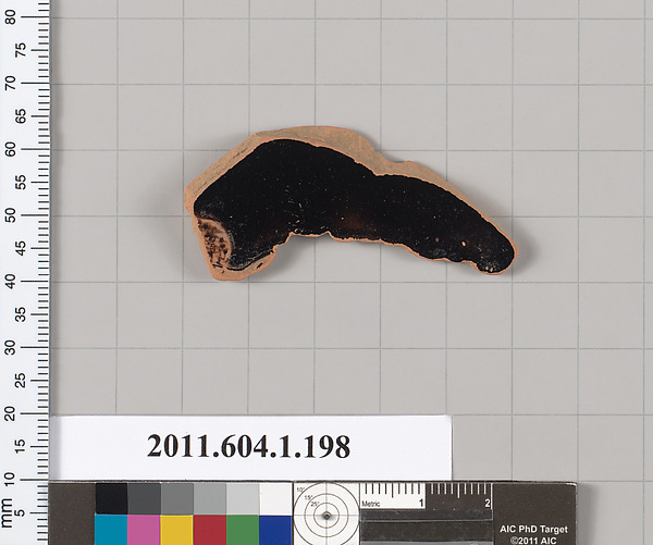 Terracotta fragment of a kylix (drinking cup)