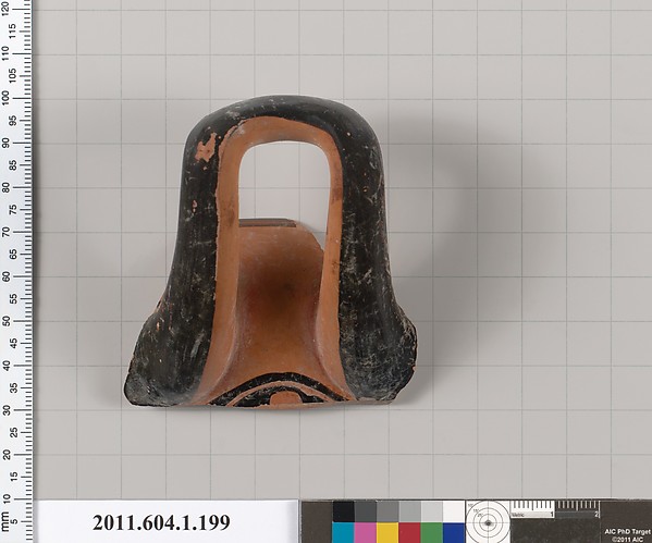 Terracotta fragment of a kylix (drinking cup)