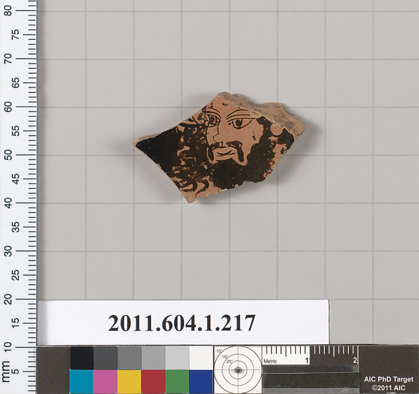 Terracotta fragment of a kylix (drinking cup)