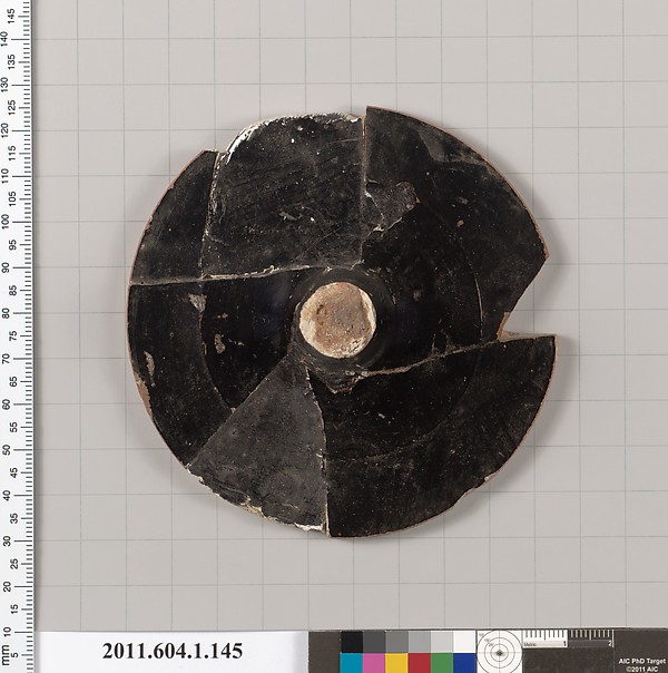Terracotta fragment of a kylix (drinking cup)