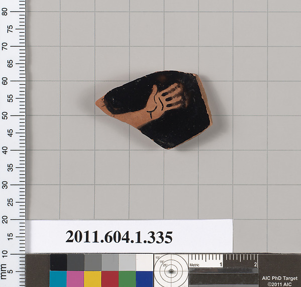 Terracotta fragment of a kylix (drinking cup)
