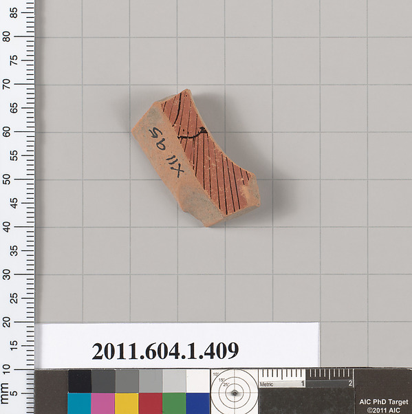 Terracotta fragment of a kylix (drinking cup)
