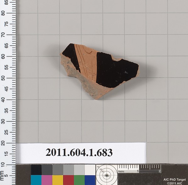 Terracotta fragment of a kylix (drinking cup)