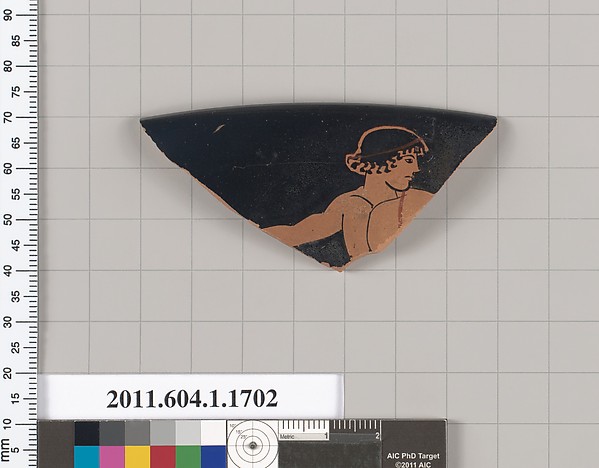Terracotta rim fragment of a kylix (drinking cup)