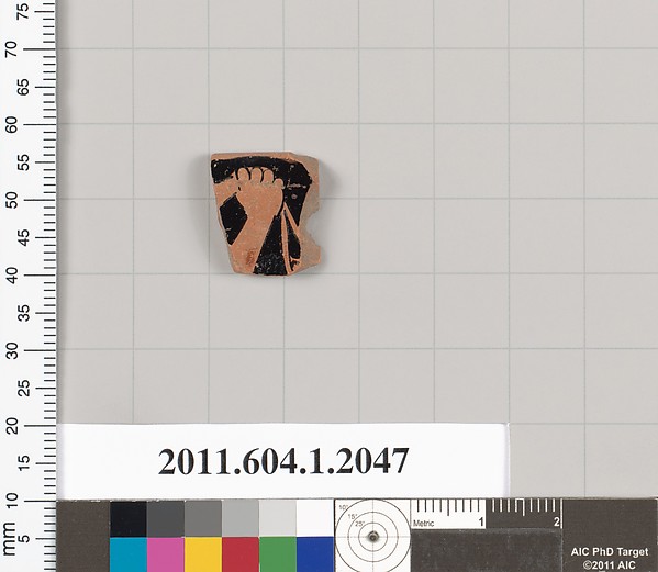 Terracotta rim fragment of a kylix (drinking cup)