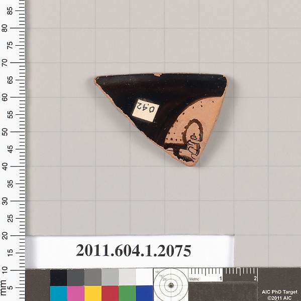 Terracotta rim fragment of a kylix (drinking cup)