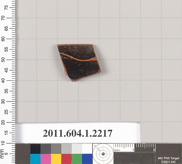 Terracotta rim fragment of a kylix (drinking cup)