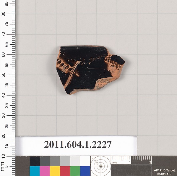 Terracotta rim fragment of a kylix (drinking cup)