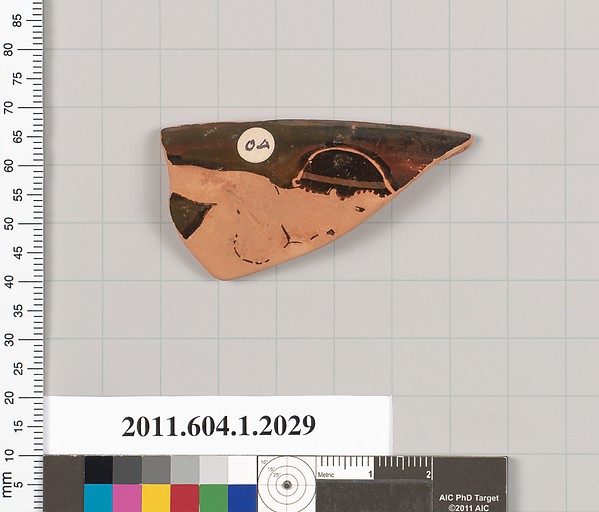 Terracotta rim fragment of a kylix (drinking cup)