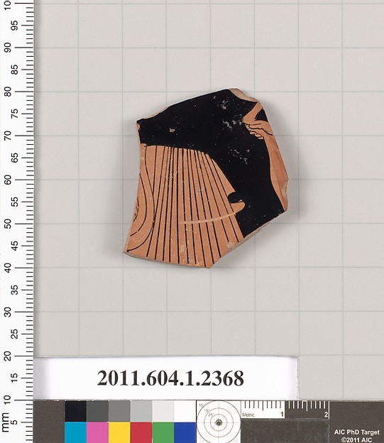Terracotta fragment of a kylix (drinking cup)
