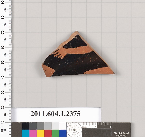 Terracotta fragment of a kylix (drinking cup)