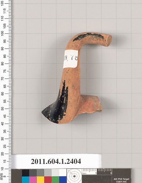 Terracotta fragment of a kylix (drinking cup)