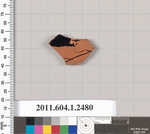 Terracotta fragment of a kylix (drinking cup)