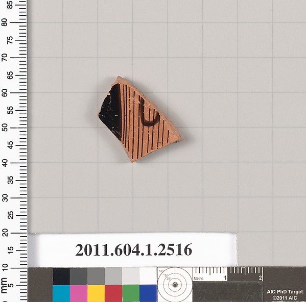 Terracotta fragment of a kylix (drinking cup)