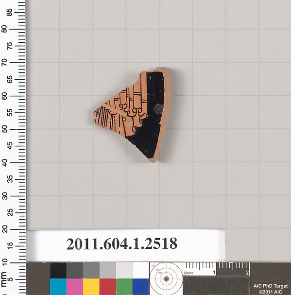 Terracotta fragment of a kylix (drinking cup)