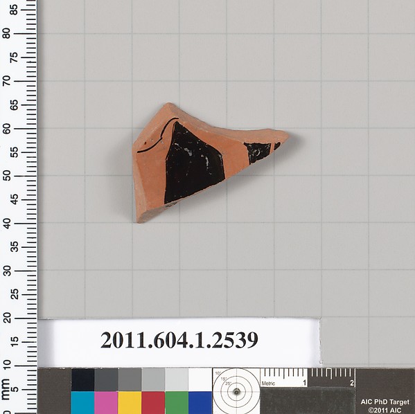 Terracotta fragment of a kylix (drinking cup)