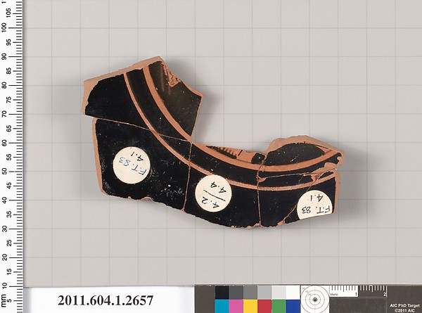 Terracotta fragment of a kylix (drinking cup)