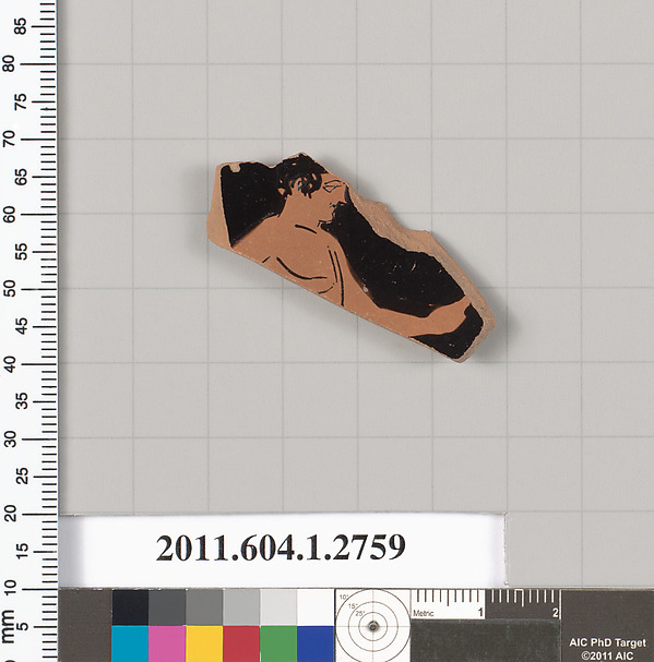 Terracotta fragment of a kylix (drinking cup)