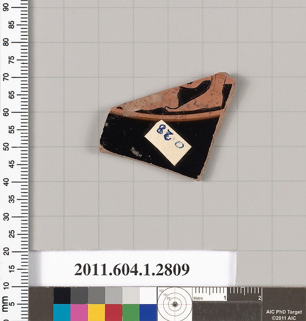 Terracotta fragment of a kylix (drinking cup)
