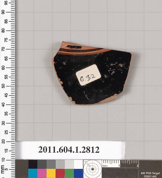 Terracotta fragment of a kylix (drinking cup)