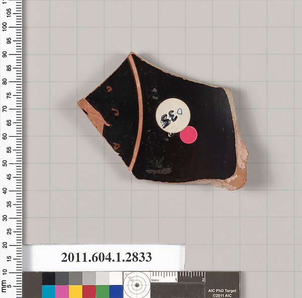 Terracotta fragment of a kylix (drinking cup)