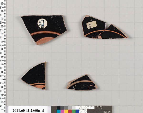 Terracotta fragments of kylikes (drinking cups)