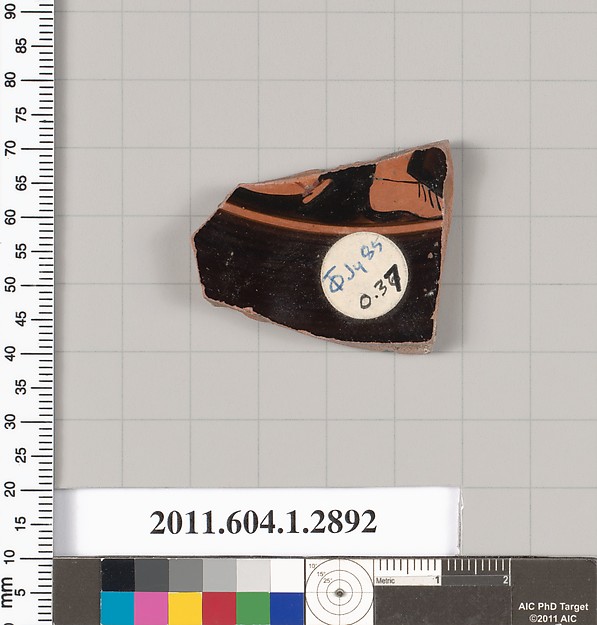 Terracotta fragment of a kylix (drinking cup)