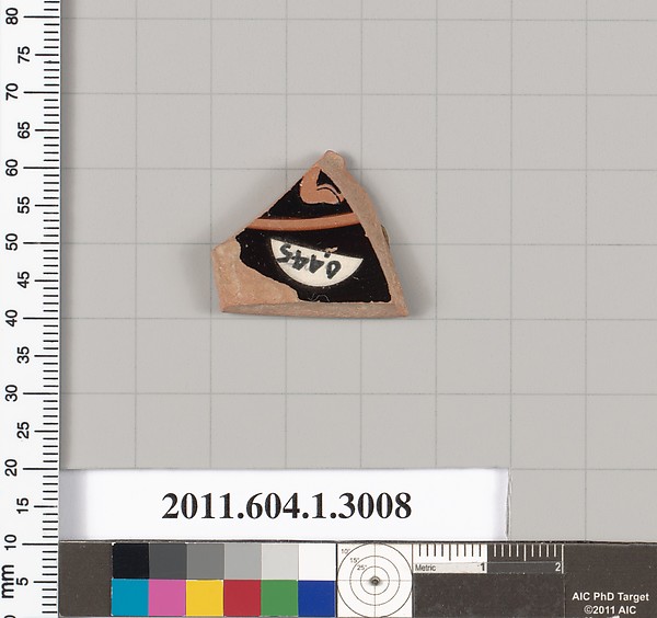 Terracotta fragment of a kylix (drinking cup)