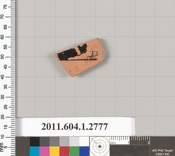 Terracotta fragment of a kylix (drinking cup)