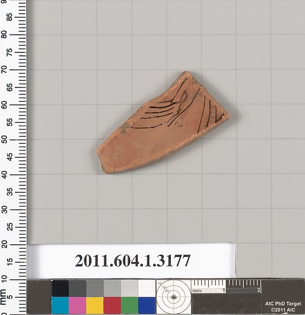 Terracotta fragment of a kylix (drinking cup)
