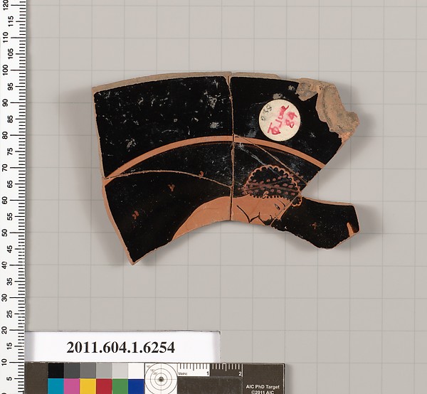 Terracotta fragment of a kylix (drinking cup)