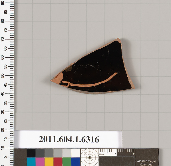Terracotta fragment of a kylix (drinking cup)